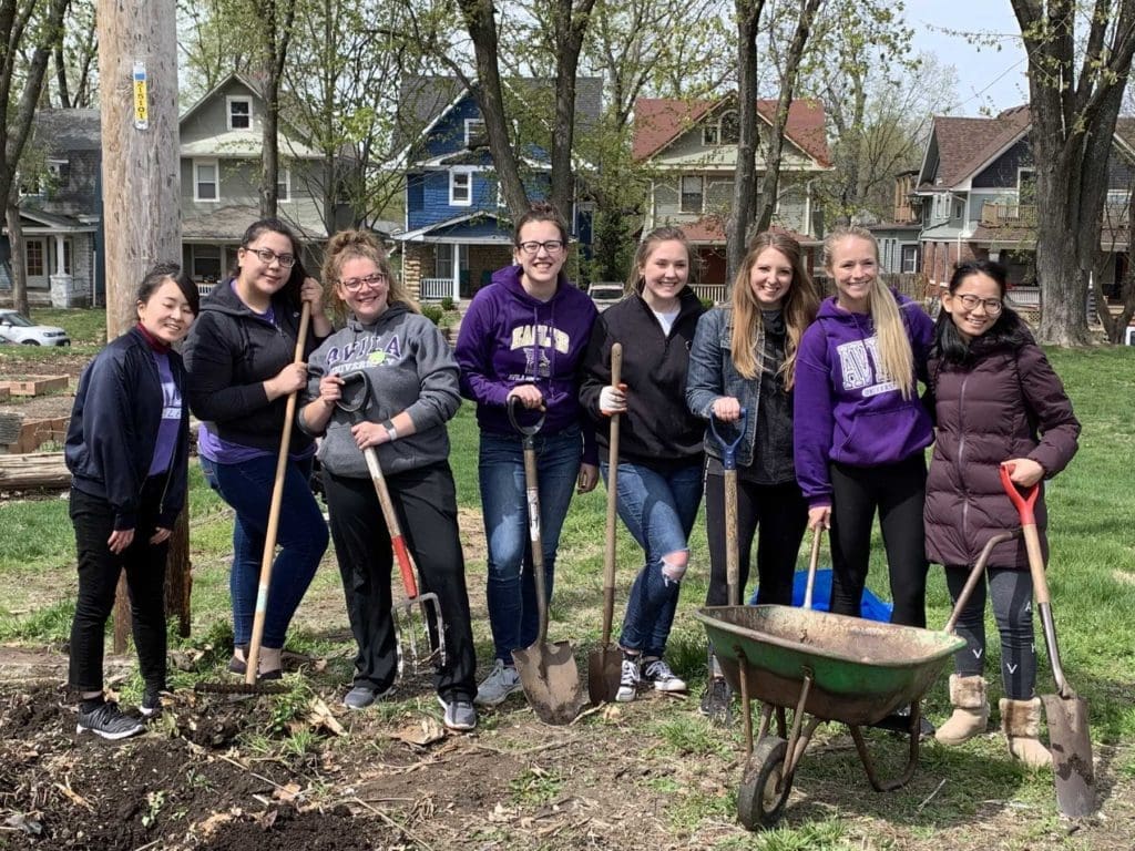 Group of students gardening during Dear Neighbor Day