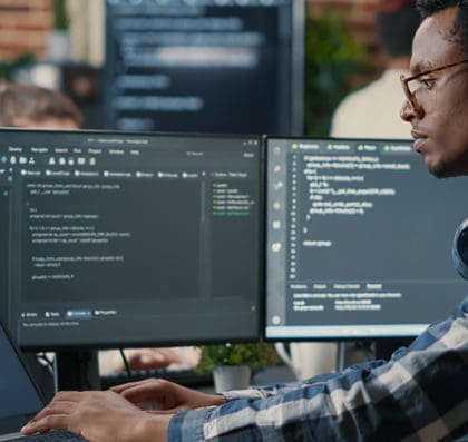 An individual working on a computer